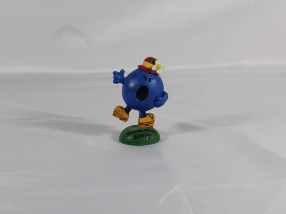 Vintage clay Little Miss Bossy figurine designed by Roger Hargreaves.