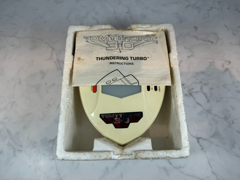 Tomytronic 3D Handheld - Thundering Turbo - Curiosity Classics